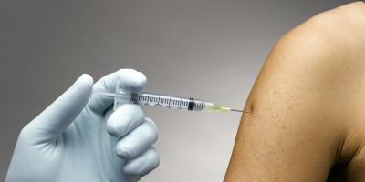 Person receiving a vaccine